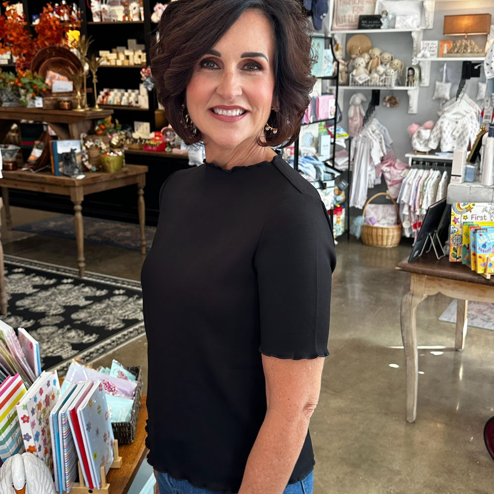 
                      
                        Anna Fitted Black Top
                      
                    