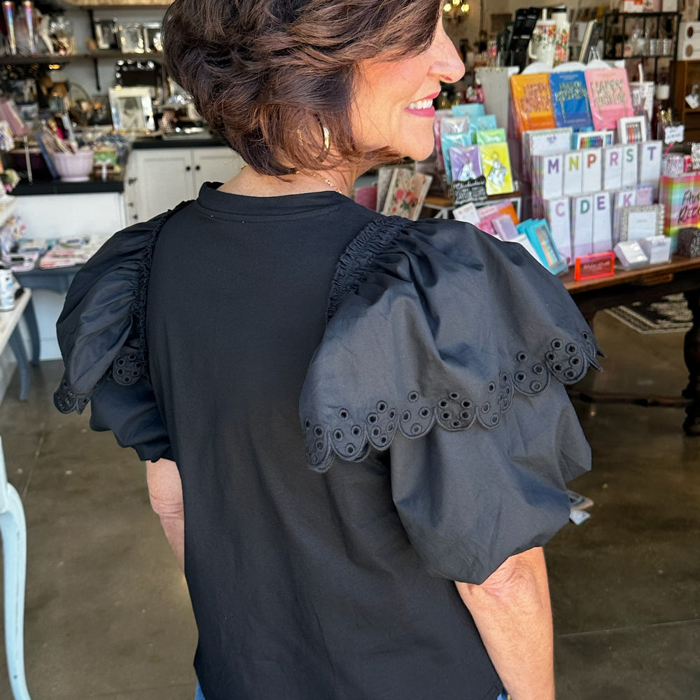 
                      
                        Black Betsy Top
                      
                    