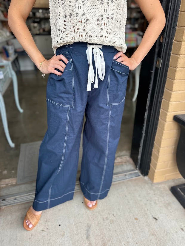
                      
                        Navy Drawstring Pant
                      
                    