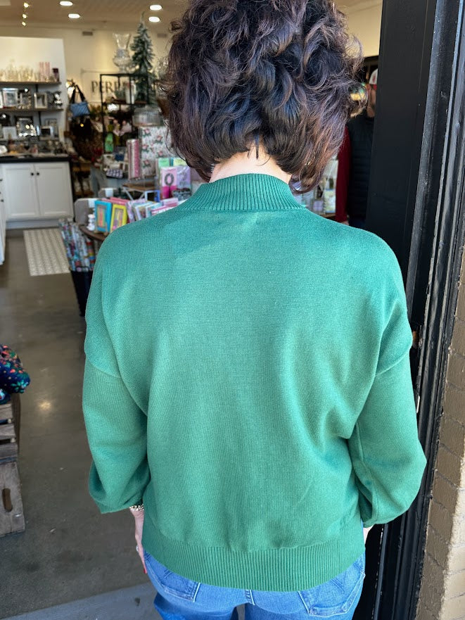 
                      
                        Holly Jolly Mock Neck Sweater (Pre-Order)
                      
                    