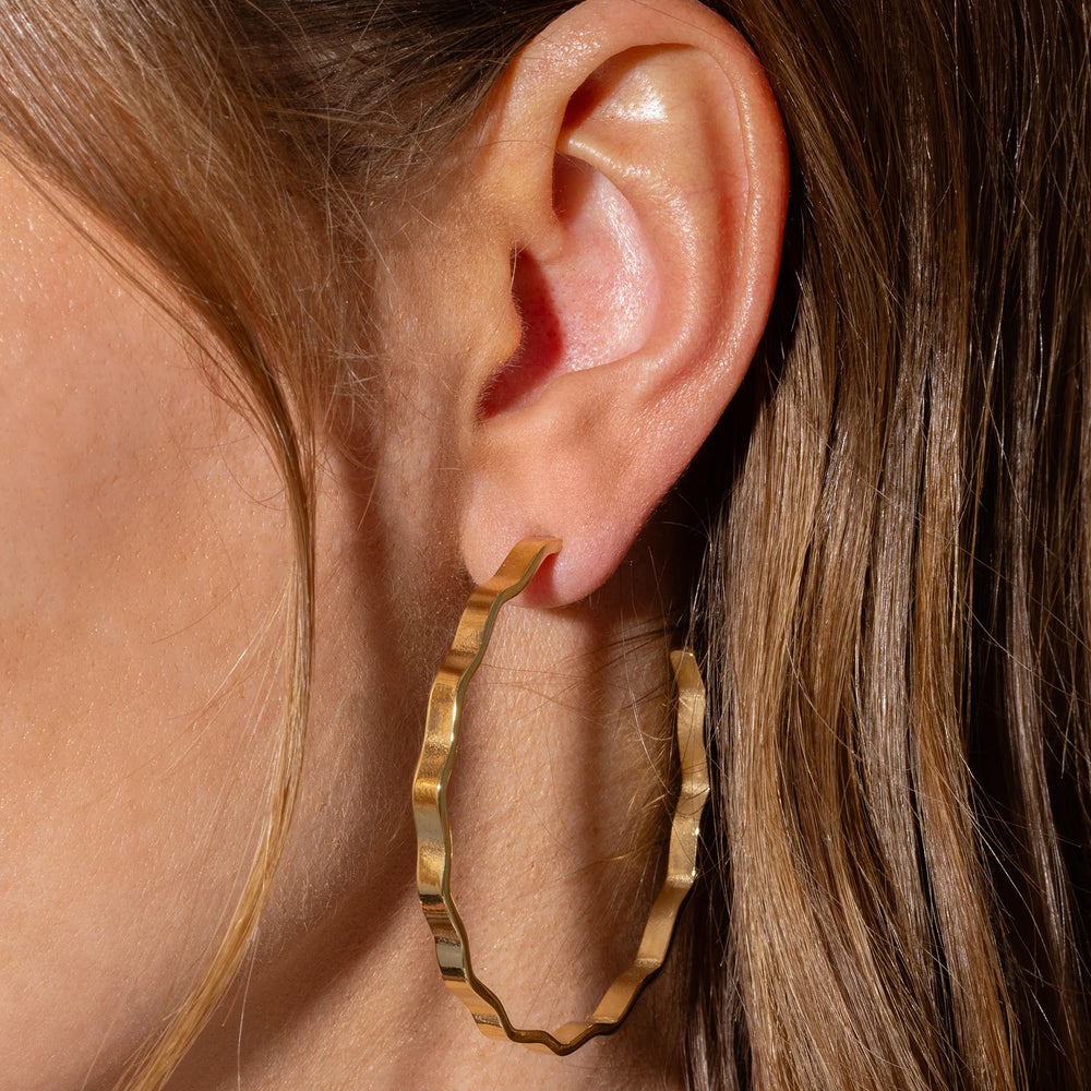 
                      
                        Large Wavy Cassie Hoop Earrings
                      
                    