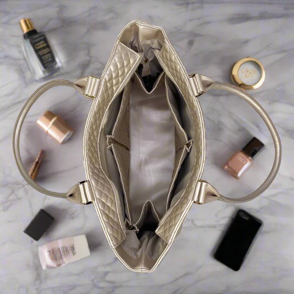 
                      
                        Pearl and Gold Quilted Getaway Tote
                      
                    